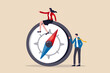 © Nuthawut - Women leadership, successful female lead business direction or lady visionary to achieve goals concept, confidence smart lady businesswoman team leader in formalwear sitting on compass leading the way