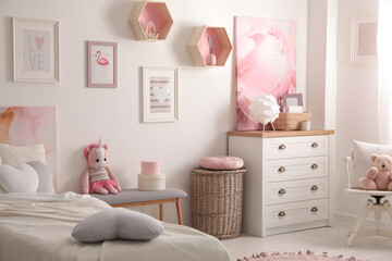 Poster - modern teenager's room interior with comfortable bed and beautiful pictures