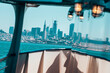 © Elliot Ross/Stocksy - San Francisco looms on the horizon from the deck of a boat