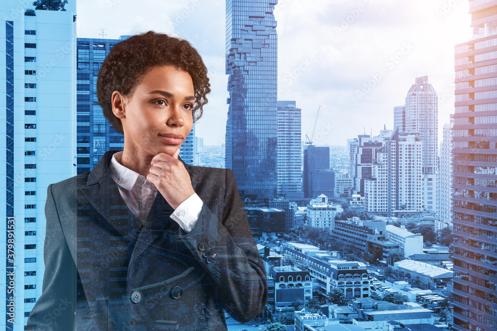 Attractive black African American business woman in suit with hand on ...