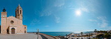 View Of The Coastal Village Of Sitges, Catalonia, Spain. Panorama Seascape