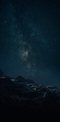 Astrophotography picture of landscape with milky way on the night sky.