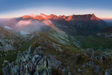 Wall Mural - Scenic image of Fairytale mountains during sunset. The sunrise over a mountain in park High Tatras. Slovakia, Europe. Wonderful Autumn landscape. Picturesque view of nature Amazing natural Background