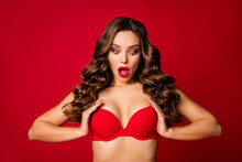 Photo Of Attractive Shocked Perfect Beauty Wavy Lady Bright Lipstick Arms Hold Unbelievable Big Breast Amazing Bra Push Up Effect Wear Brassiere Isolated Vibrant Red Color Background
