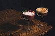 © svitlini - Sour trendy drinks with egg foam and filling. Raspberry mint and Coffee with spices cocktails in hard light