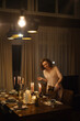© Pietro Karras/Stocksy - Woman pouring wine