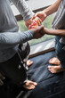 © Jovo Jovanovic/Stocksy - Couple holding hands standing next to the window at home