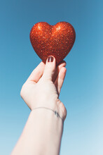 Hand Holding A Red Heart