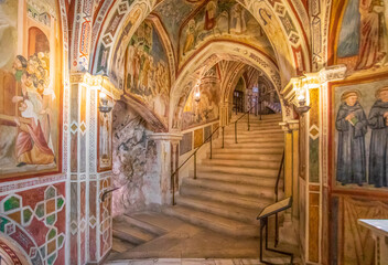 Wall Mural - Subiaco, Italy - main sight of Subiaco and one of the most beautiful Benedictine monasteries in the World, the Sacro Speco Monastery displays amazing frescoes. Here in particular its interiors