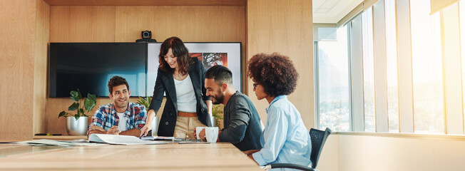 Wall Mural - Multi ethnic business people meeting in conference room