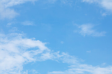 Wall Mural - blue sky background and white clouds soft focus, and copy space