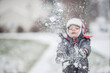 © CWP, LLC/Stocksy - Toddler boy throwing snow in the air