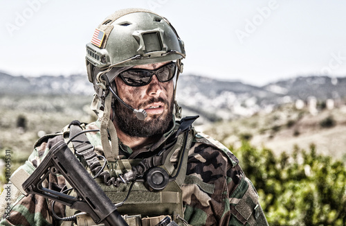Fotomural Shoulder portrait of army soldier, special forces fighter, modern warfare combat