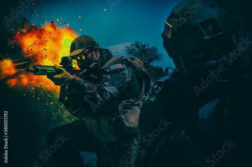 Fotomural Army special operations forces soldiers, Navy SEALs team armed assault rifle, rushing on battlefield with fiery explosion, attacking enemy at night