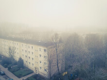 Heavy Fog Over Post-war Residential Area