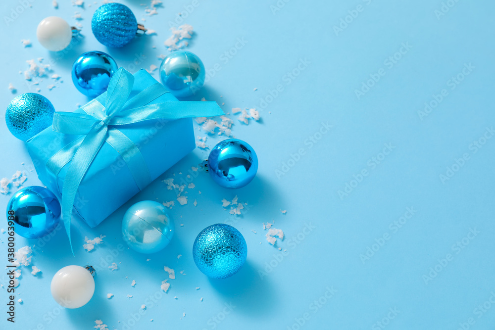 Beautiful Christmas gift on color background
