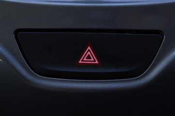 Poster - Button to turn on a car's warning signal.
