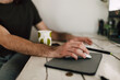 © Dimitrije Tanaskovic/Stocksy - Man working on computer