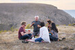 © Per Swantesson/Stocksy - Mixed group of fridns chatting