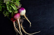 © Studiofena/Stocksy - Turnips on dark metal background