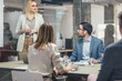 © Lumina/Stocksy - Businesswoman Making Presentation