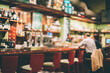 © JAVIER PARDINA/Stocksy - Defocused photography of the interior of a typical bar in Spain.