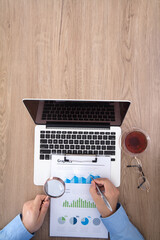 Wall Mural - Male worker working at desk