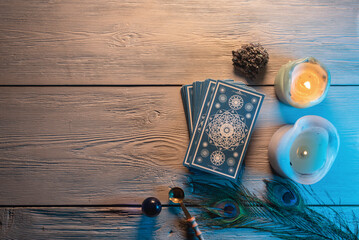 Wall Mural - Tarot cards deck on the fortune teller desk table background. Future reading concept.