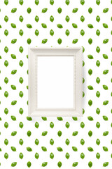 Wall Mural - Basil. Green leaves of fresh italian basil background on whte backdrop. Basil leaves isolated on white background. flat lay Picture frame on wall - mockup