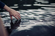 © Kitty Kleyn/Stocksy - Touching the water