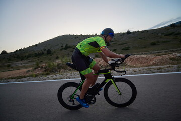 Poster - triathlon athlete riding bike