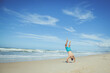 © Diane Durongpisitkul/Stocksy - Beach Handstand