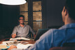© Lumina/Stocksy - Businessmen Chatting at Work
