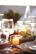 © Jill Chen/Stocksy - Candle lit dinner party