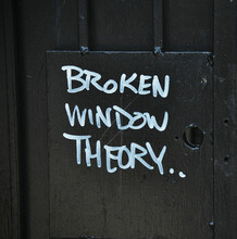 broken window theory written on black