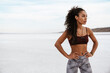 © Drobot Dean - Image of african american sportswoman standing while working out