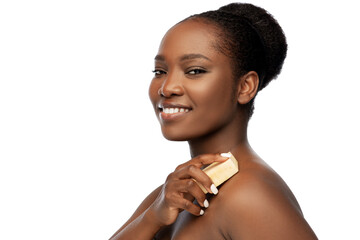 Wall Mural - beauty and people concept - portrait of happy smiling young african american woman with bare shoulders over white background