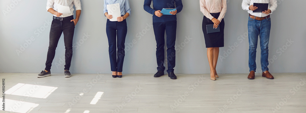 People waiting for job interview or workers waiting for boss's invitation to sign their papers - obrazy, fototapety, plakaty 