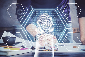 Concept of the future of security and password control through advanced technology. Fingerprint scan provides safe access with biometrics identification. Multi exposure.