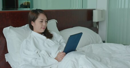 Poster - Woman work on laptop computer at hotel room at quarantine period