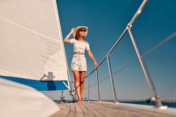 Wall Mural - Woman on yacht