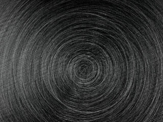 Black circular brushed steel surface background, grained metal texture