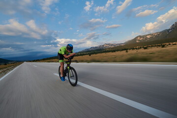 Poster - triathlon athlete riding bike