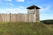View of viking village wooden tower with palisade
