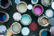 © Deirdre Malfatto/Stocksy - colorful old cans of paint