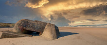 Ruins Of German Bunker In The Beach Of Normandy, France