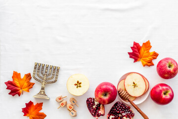 Wall Mural - Jewish cuisine for rosh hashana holiday - apple honey and pomegranate, top view