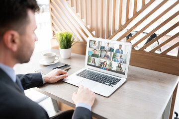 Wall Mural - Businessman having a conference video call