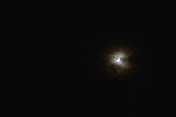 Wall Mural - half moon cover by spreading cloud in night