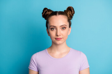 Canvas Print - Closeup photo of attractive teen lady two funny buns good mood smile without teeth pretty appearance nice person youth wear casual purple t-shirt isolated blue color background